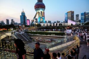China's economy slows as consumers tighten belts, US tariff risks mount