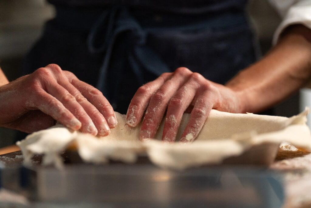 The unlikely rise of Karyn Tomlinson, who traveled to France in her 20s to learn how to cook and just won the culinary world’s most prestigious award